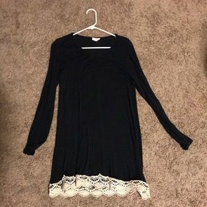 Navy blue dress with lace at the bottom